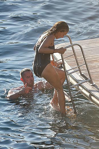 Sarah Jessica Parker in a swimsuit on a beach & yacht in Ibiza