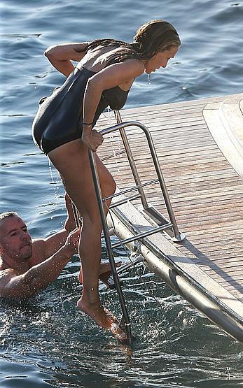 Sarah Jessica Parker in a swimsuit on a beach & yacht in Ibiza