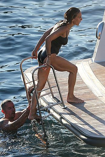 Sarah Jessica Parker in a swimsuit on a beach & yacht in Ibiza