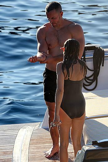 Sarah Jessica Parker in a swimsuit on a beach & yacht in Ibiza