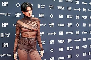 Sasha Calle braless in see through dress at The On Swift Horses premiere in Toronto