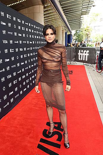 Sasha Calle braless in see through dress at The On Swift Horses premiere in Toronto