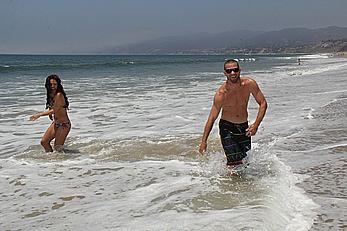 Sharna Burgess in bikni on a beach in Malibu