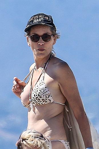 Sharon Stone tit slip in bikini in Venice