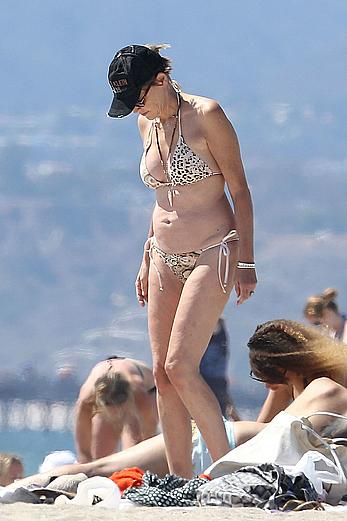 Sharon Stone tit slip in bikini in Venice