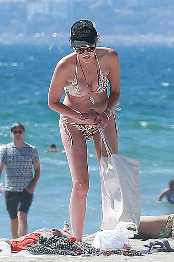 Sharon Stone tit slip in bikini in Venice