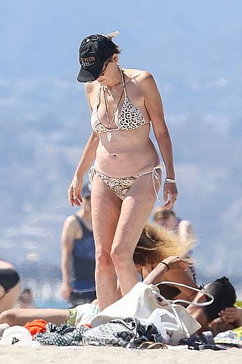 Sharon Stone tit slip in bikini in Venice