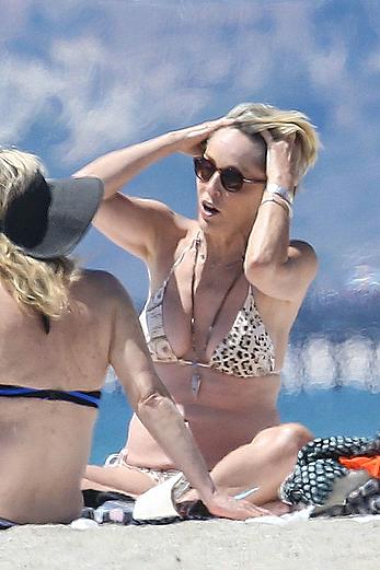 Sharon Stone tit slip in bikini in Venice