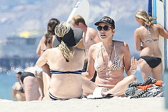 Sharon Stone tit slip in bikini in Venice