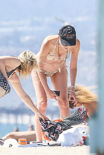 Sharon Stone tit slip in bikini in Venice