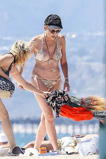 Sharon Stone tit slip in bikini in Venice