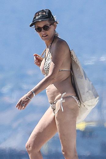 Sharon Stone tit slip in bikini in Venice