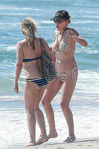 Sharon Stone tit slip in bikini in Venice