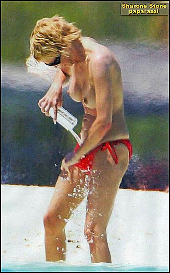 Sharon Stone topless on a beach in red bikini panties paparazzi photos