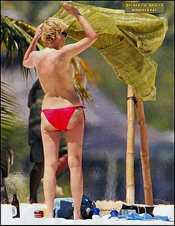 Sharon Stone topless on a beach in red bikini panties paparazzi photos