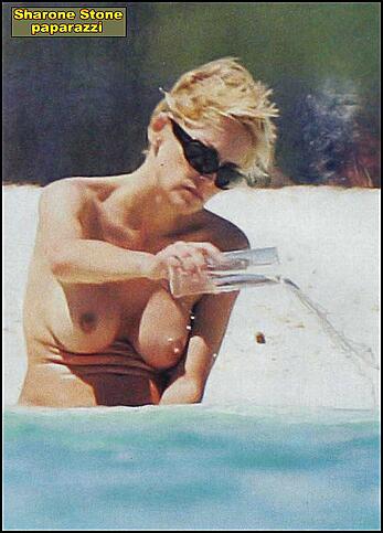 Sharon Stone topless on a beach in red bikini panties paparazzi photos