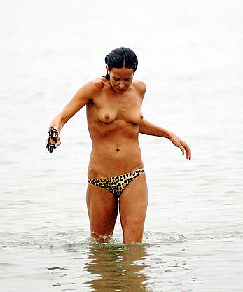 Sophie Anderton swimming topless in Venice