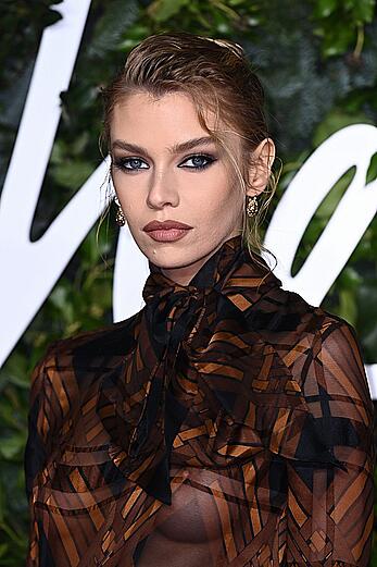 Stella Maxwell braless in see through dress at British Fashion Awards 2021