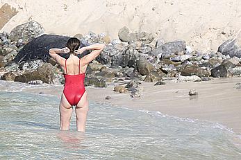 Stephanie Seymour sexy in red tight monokini on the beach in St. Barts