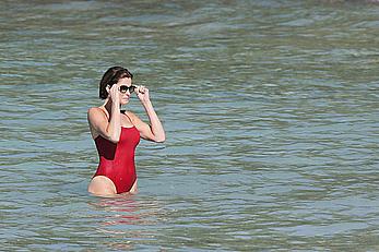 Stephanie Seymour sexy in red tight monokini on the beach in St. Barts