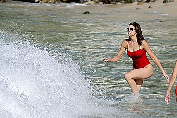 Stephanie Seymour sexy in red tight monokini on the beach in St. Barts