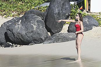 Stephanie Seymour sexy in red tight monokini on the beach in St. Barts