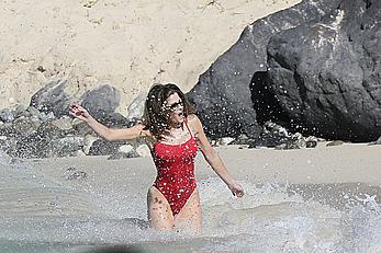 Stephanie Seymour sexy in red tight monokini on the beach in St. Barts