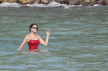 Stephanie Seymour sexy in red tight monokini on the beach in St. Barts