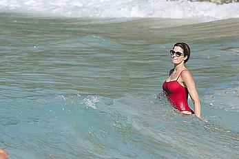 Stephanie Seymour sexy in red tight monokini on the beach in St. Barts