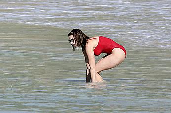 Stephanie Seymour sexy in red tight monokini on the beach in St. Barts