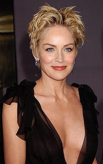 Sharon Stone posing in see through dress