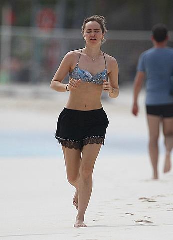 Suki Waterhouse jogging on the beach in Mexico