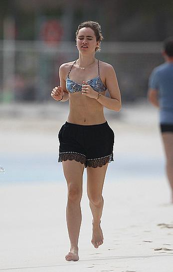 Suki Waterhouse jogging on the beach in Mexico