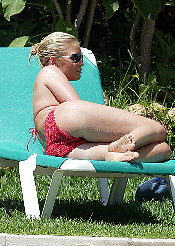 Suzanne Shaw sunbathing topless