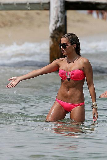 Sylvie van der Vaart sexy in pink in Saint-Tropez