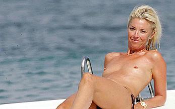 Tamara Beckwith sunbathing topless in Italy