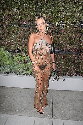 Tana Mongeau braless in see through dress at Grammy after party in Los Angeles