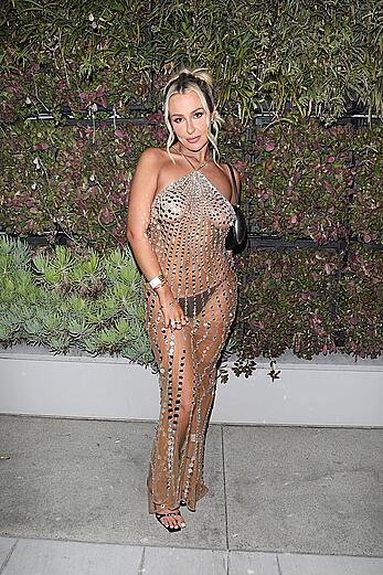 Tana Mongeau braless in see through dress at Grammy after party in Los Angeles