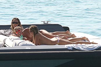 Tania Cagnotto sunbathing topless on a boat