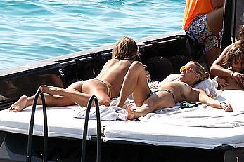 Tania Cagnotto sunbathing topless on a boat