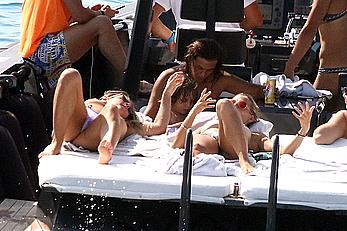 Tania Cagnotto sunbathing topless on a boat