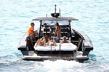 Tania Cagnotto sunbathing topless on a boat