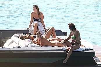 Tania Cagnotto sunbathing topless on a boat