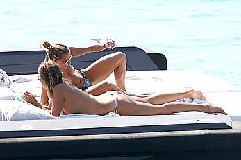 Tania Cagnotto sunbathing topless on a boat