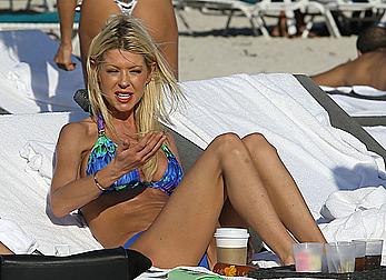 Tara Reid cleavage and cameltoe in bikini in Miami