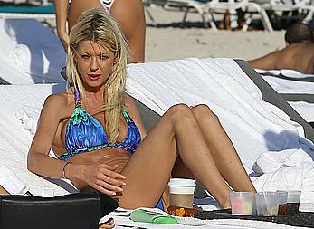 Tara Reid cleavage and cameltoe in bikini in Miami