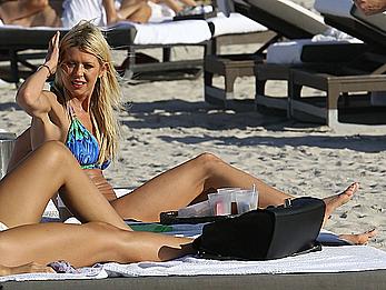 Tara Reid cleavage and cameltoe in bikini in Miami