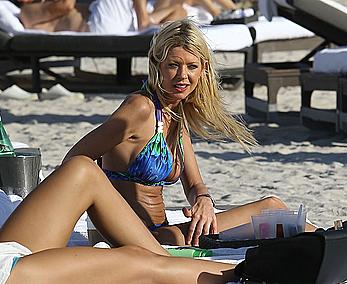 Tara Reid cleavage and cameltoe in bikini in Miami