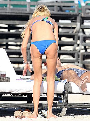 Tara Reid cleavage and cameltoe in bikini in Miami