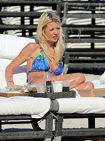 Tara Reid cleavage and cameltoe in bikini in Miami